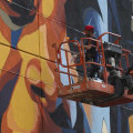 What is the process for maintaining a mural or graffiti piece in harris county?